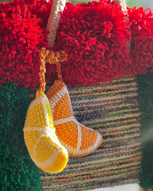 Boucle Knot Basket Bag with Playful Oversized Pompoms and Hand-Knit Charm