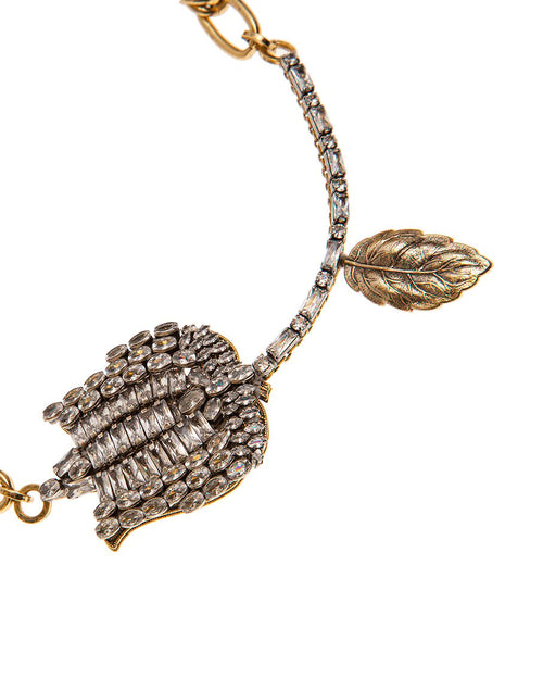 Clear crystals and antique gold necklaces