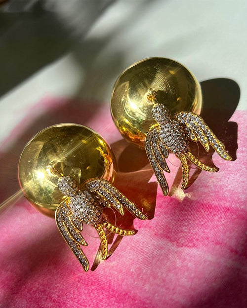 Earring with bird and ball